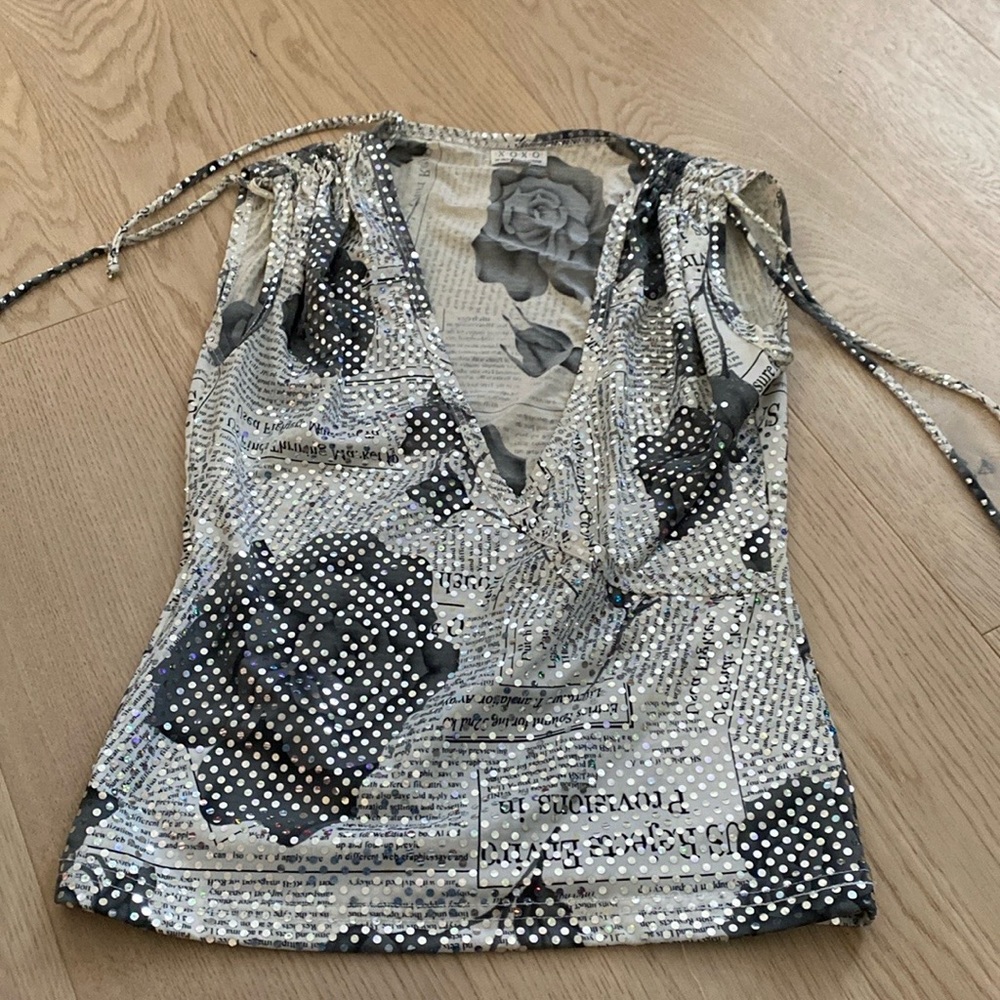 This top will be perfect for the holidays or a night out on the town.